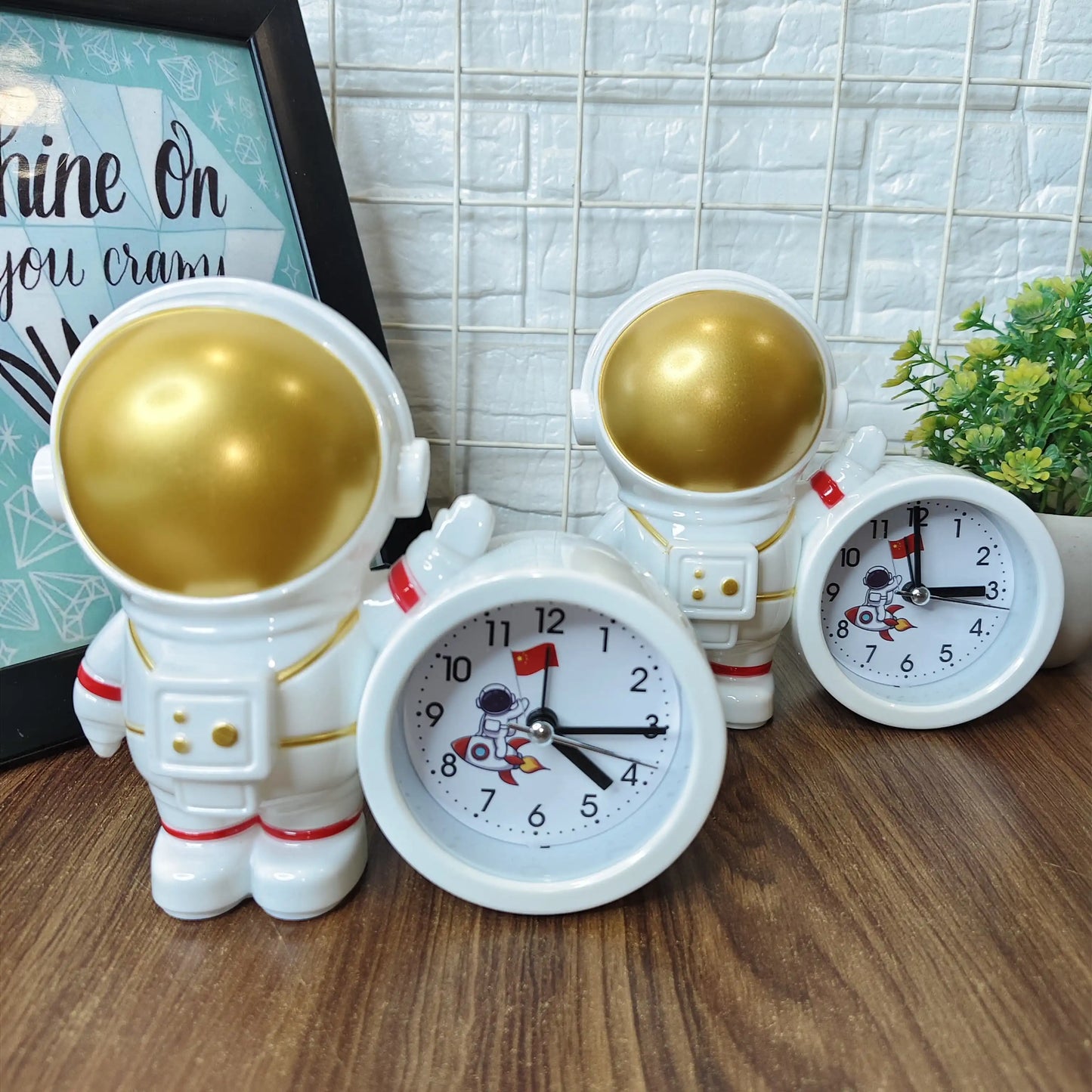 Alarm clock with pen stand