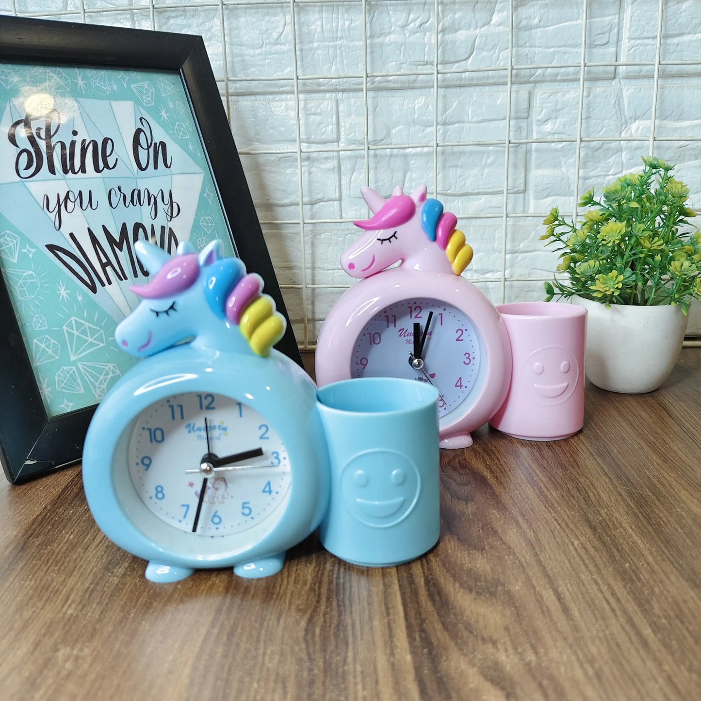 Alarm clock with pen stand