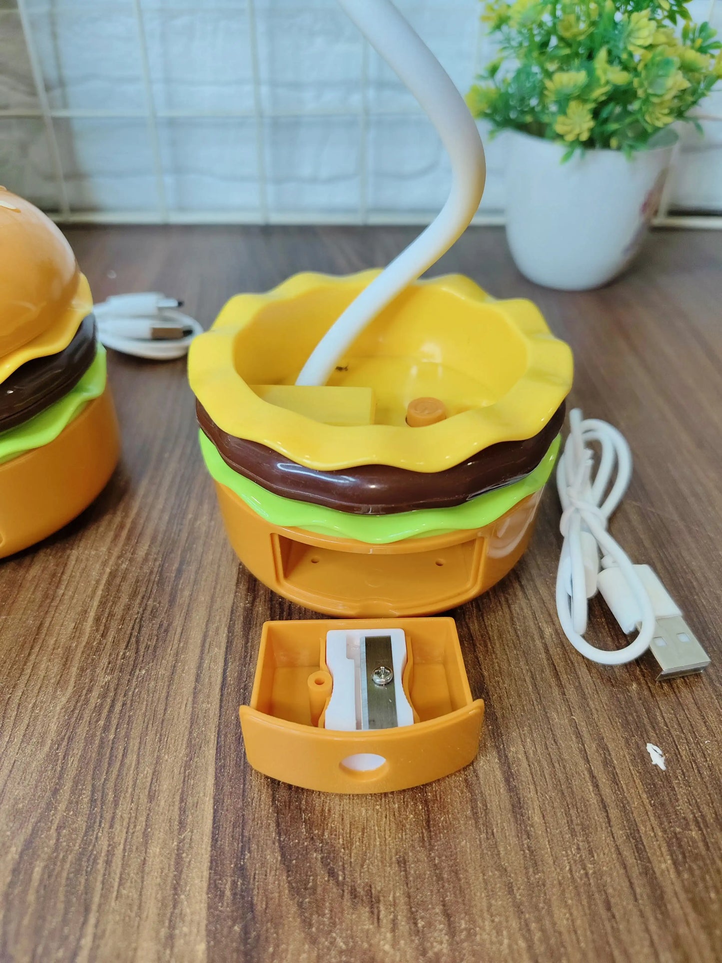 Burger lamp with sharpener