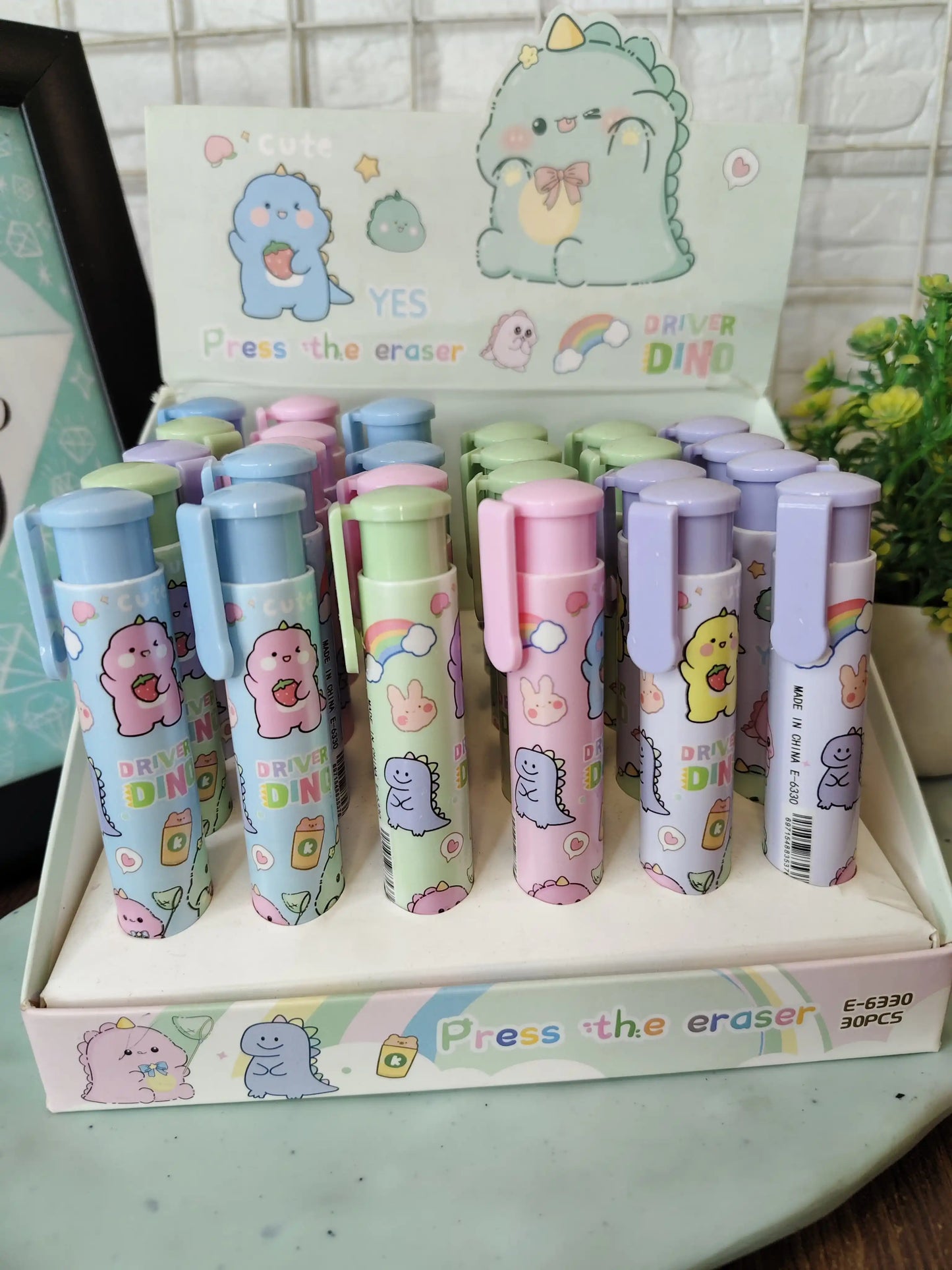 Cute dino click eraser