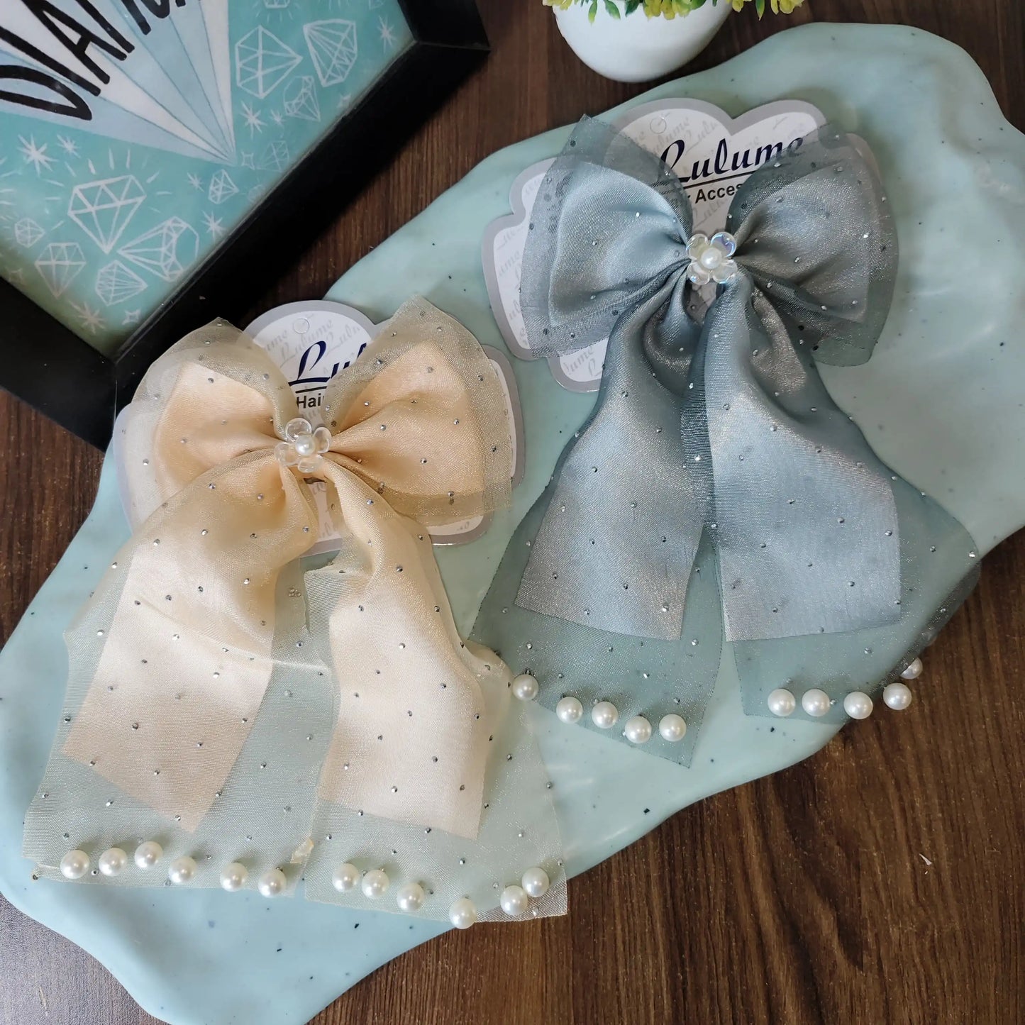 Double fabric pearl emblished bows
