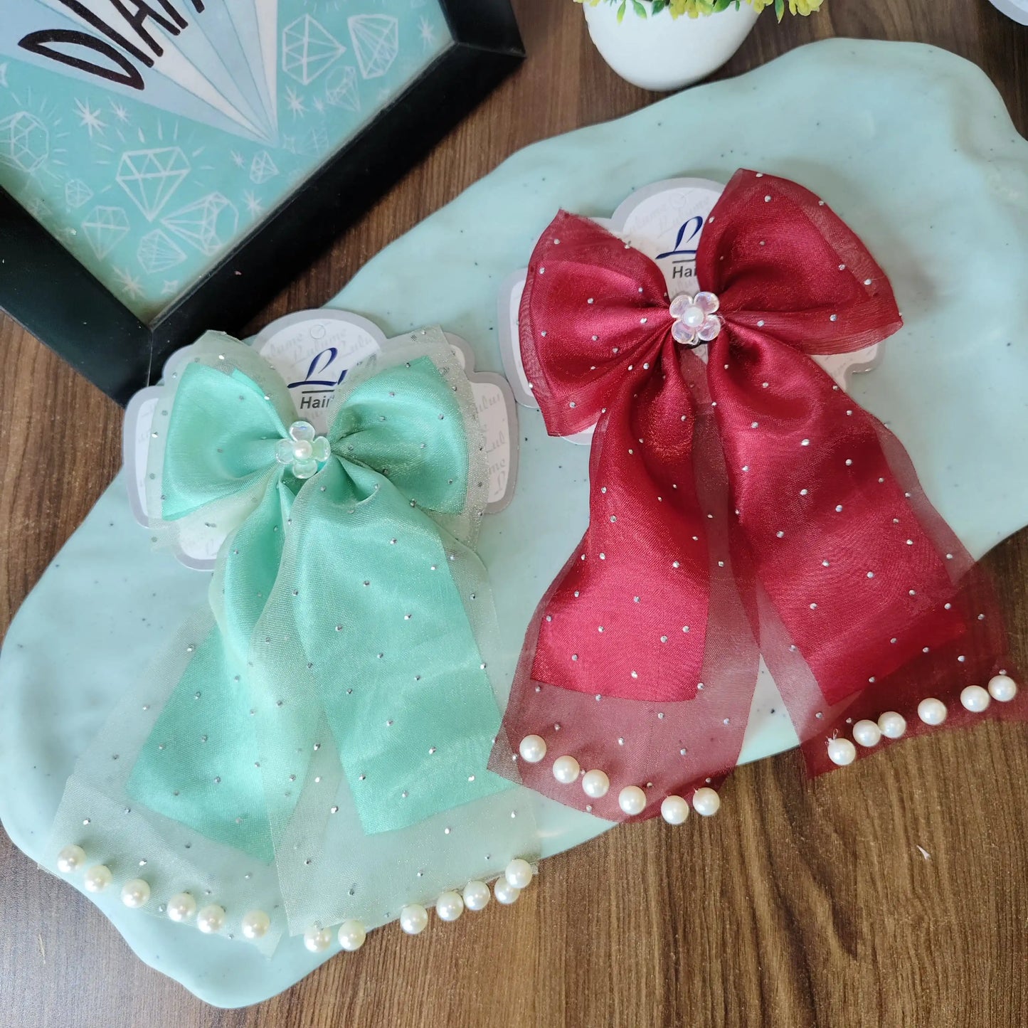 Double fabric pearl emblished bows