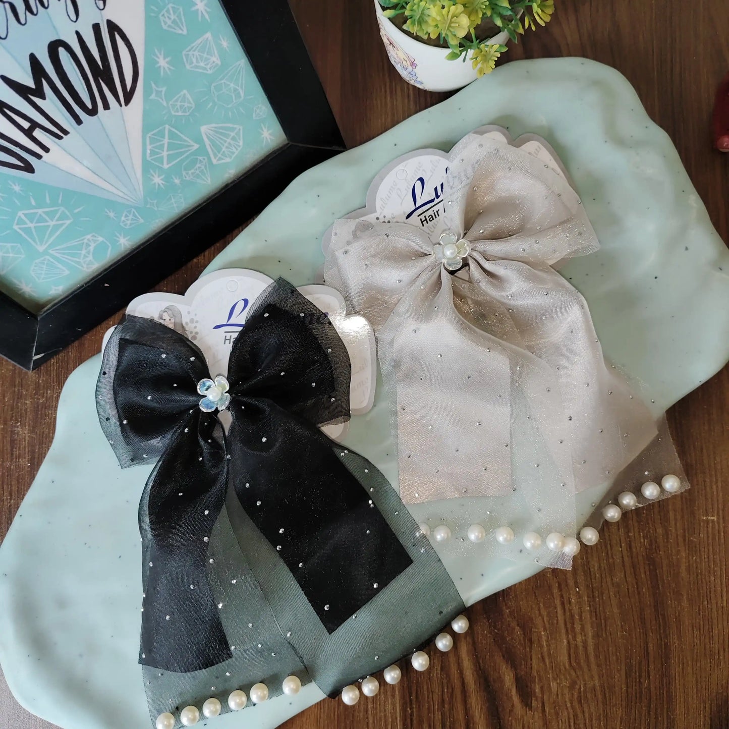 Double fabric pearl emblished bows