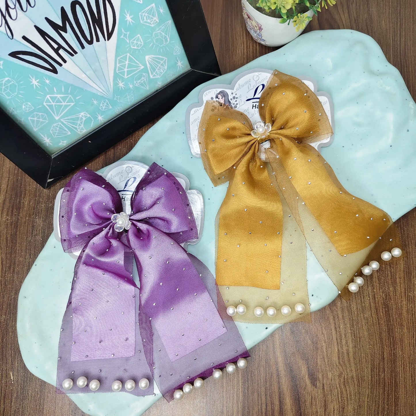 Double fabric pearl emblished bows