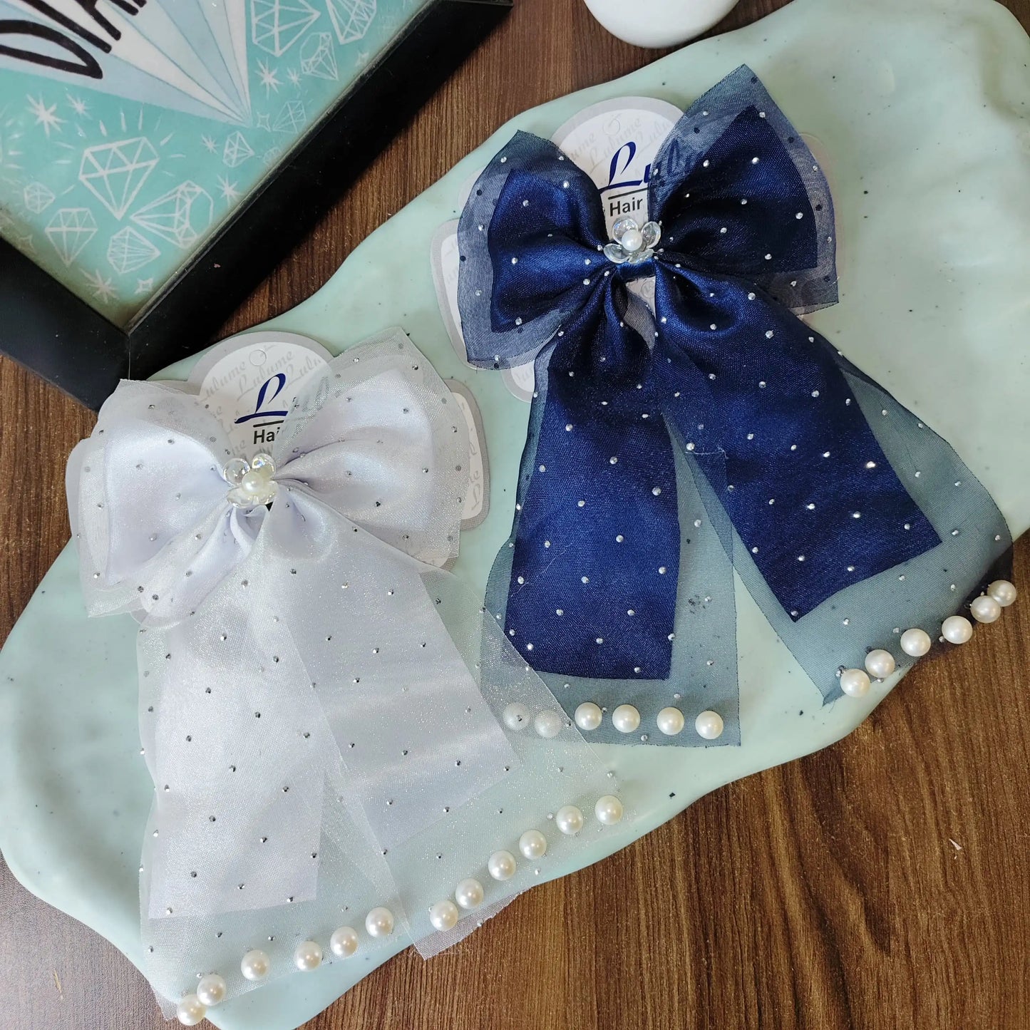 Double fabric pearl emblished bows