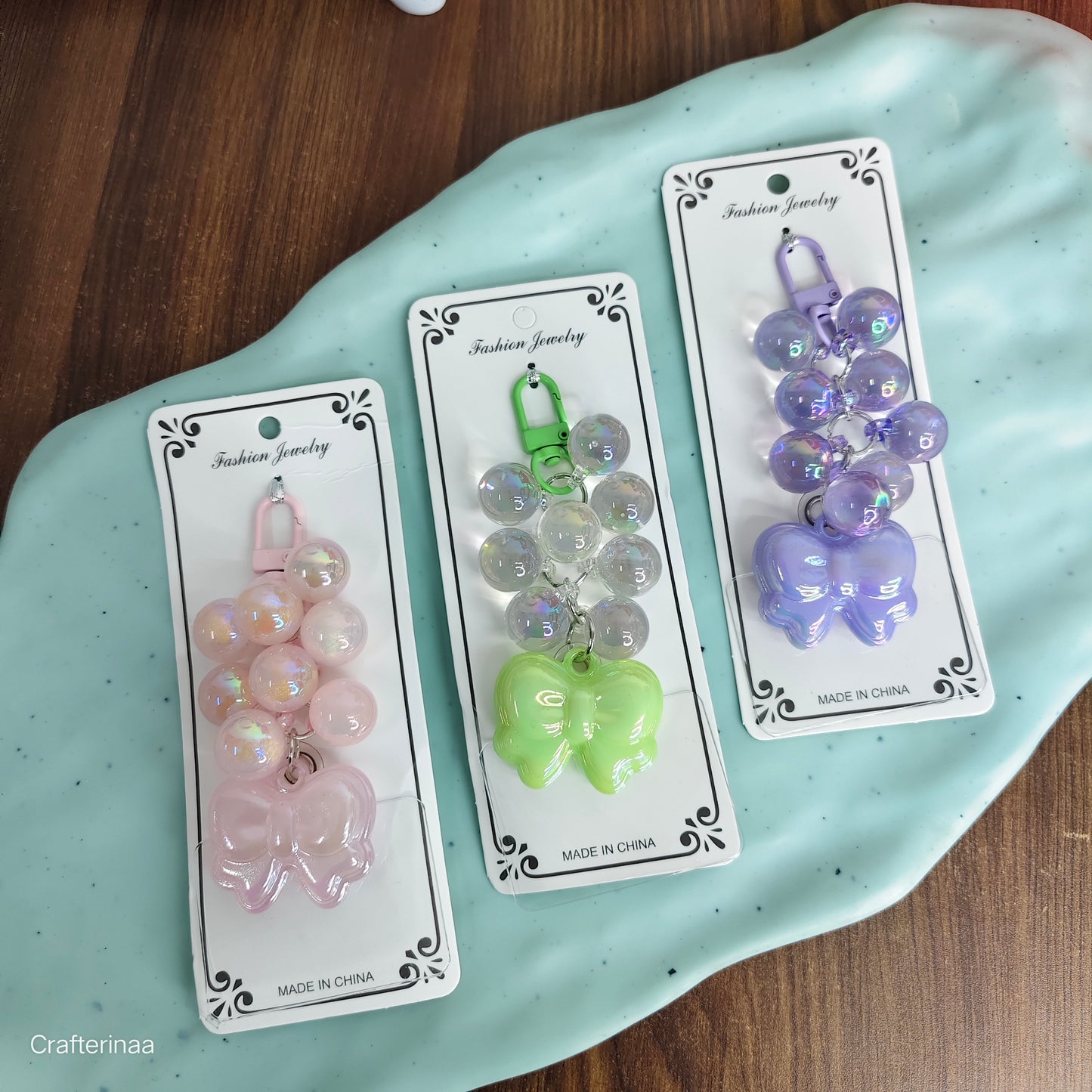 Holographic pearls with bow charm | holographic keychain