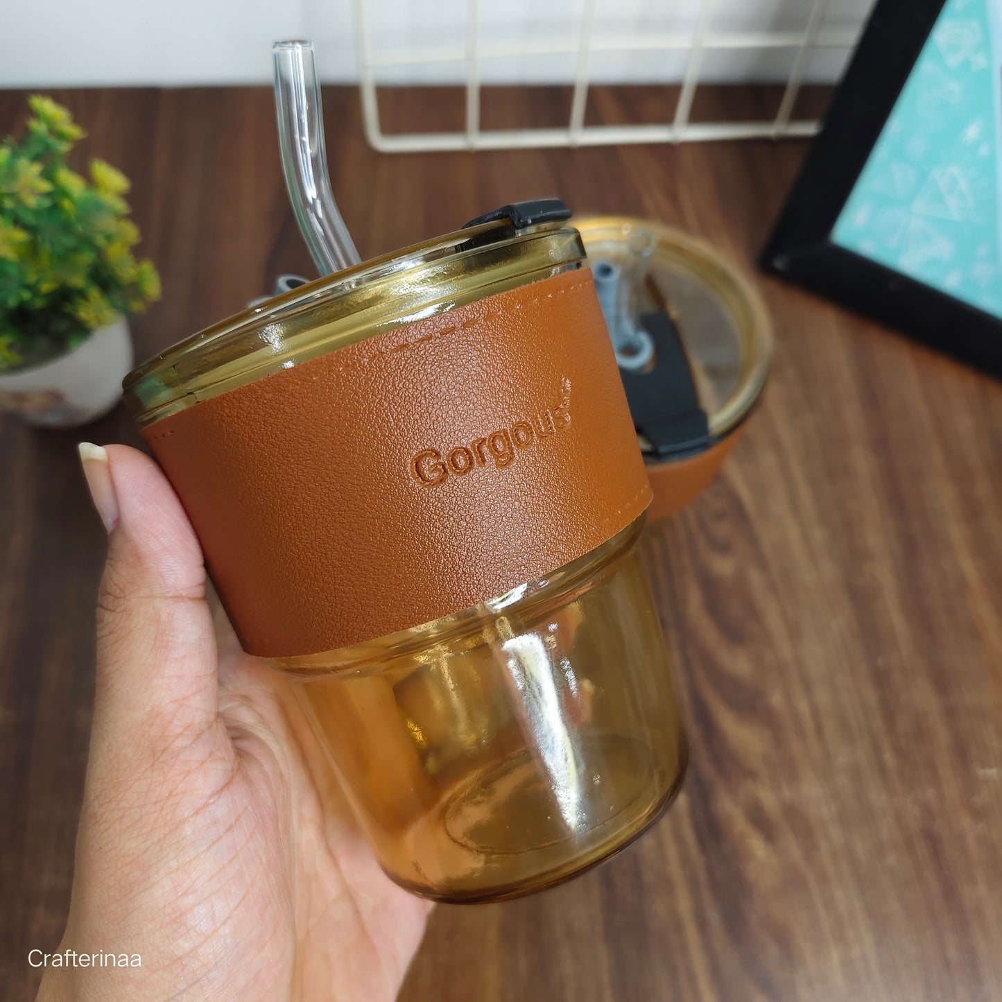 "Elegant Glass Travel Tumbler – Brown Leather Wrap & Transparent Straw"