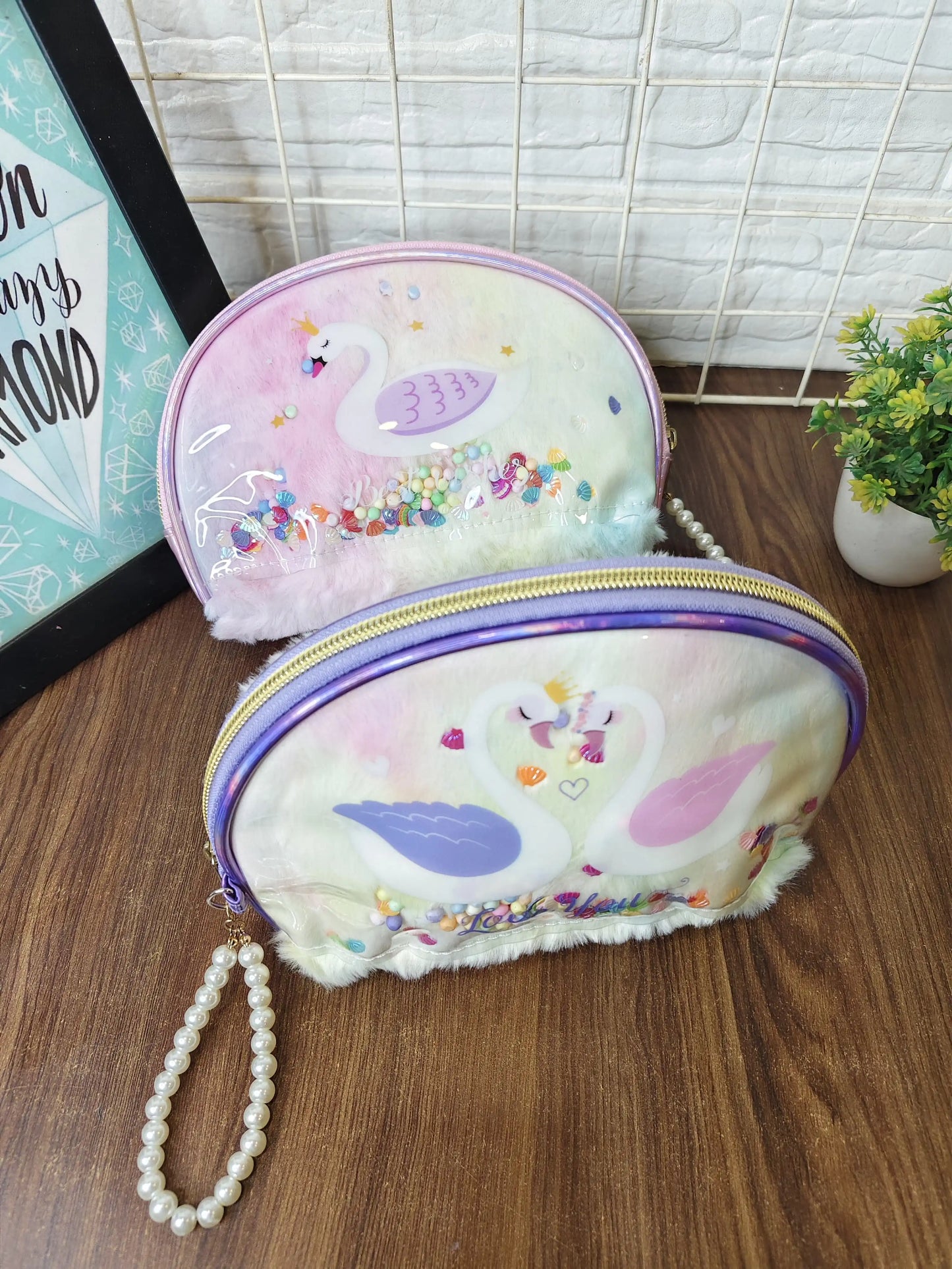 swan makeup pouch with pearl handle