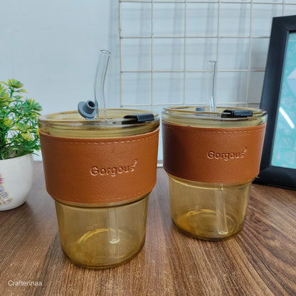 "Elegant Glass Travel Tumbler – Brown Leather Wrap & Transparent Straw"