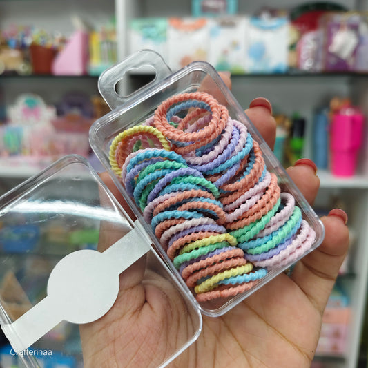 "Spiral Hair Rubber Bands – 1 Box of 30+ Colorful, Stretchable Hair Ties for Daily Use”