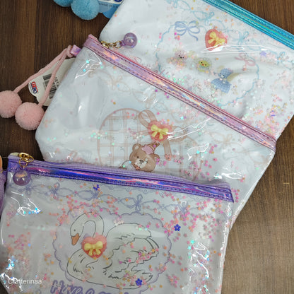 "Glitter Transparent Zipper Pouch – Cute Cartoon Print with Pom Pom Charm"