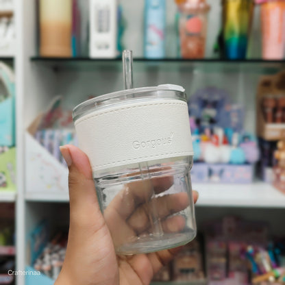 "Elegant Glass Travel Tumbler – Brown Leather Wrap & Transparent Straw"